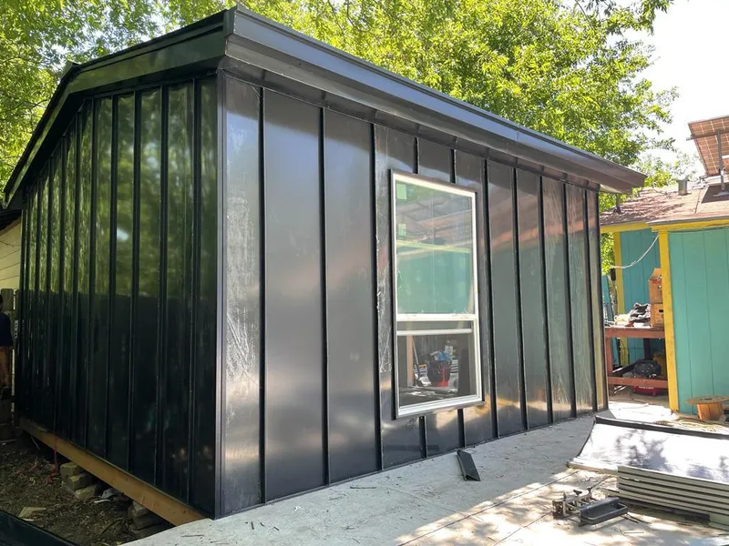 Black standing seam metal wall panels for Roof Inspection in Mauldin